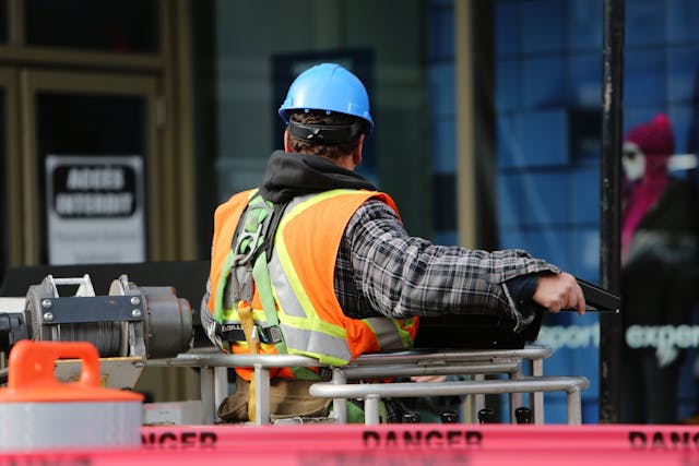 https://www.pexels.com/photo/man-wearing-hard-hat-standing-8159/ construction worker
